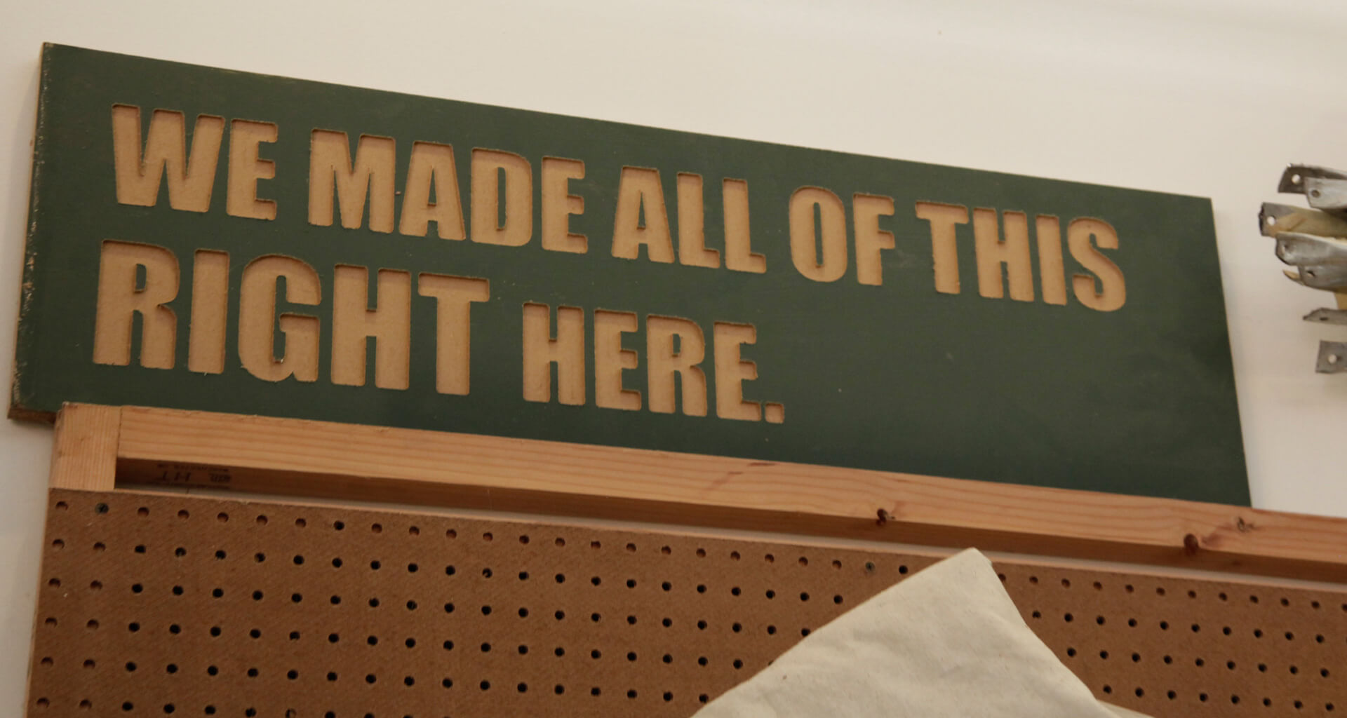 WE MADE ALL OF THIS RIGHT HERE sign in Cincinnati workshop