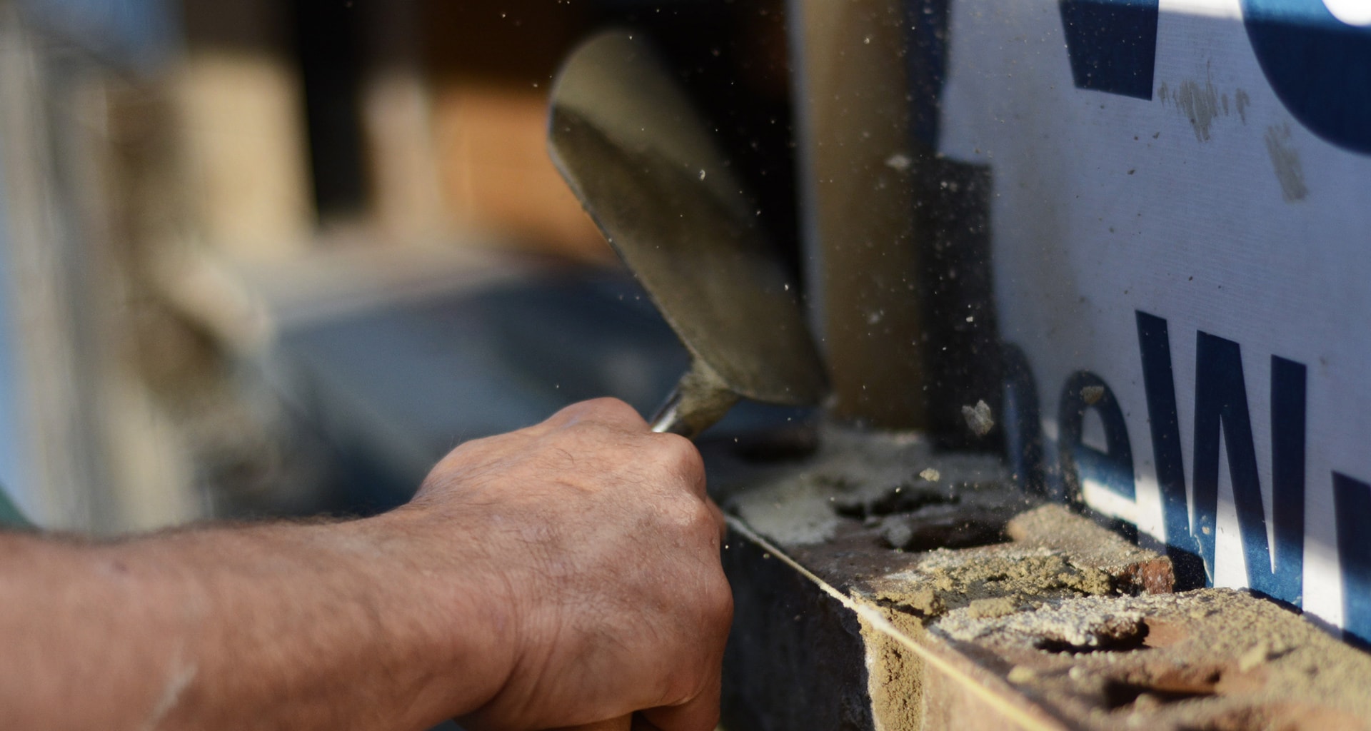Someone working on a home with tools