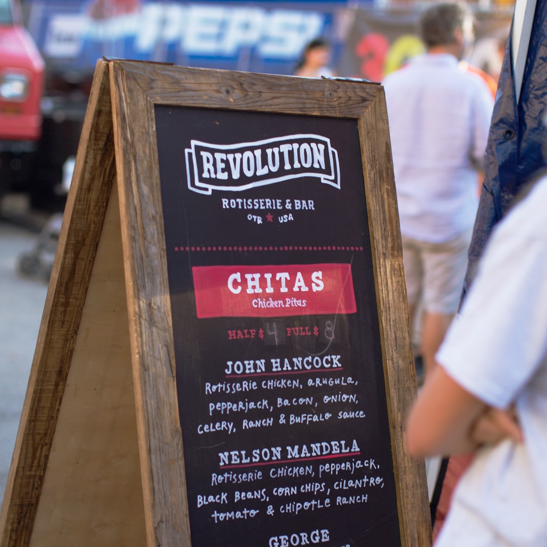 Revolution Rotisserie sign at MPMF