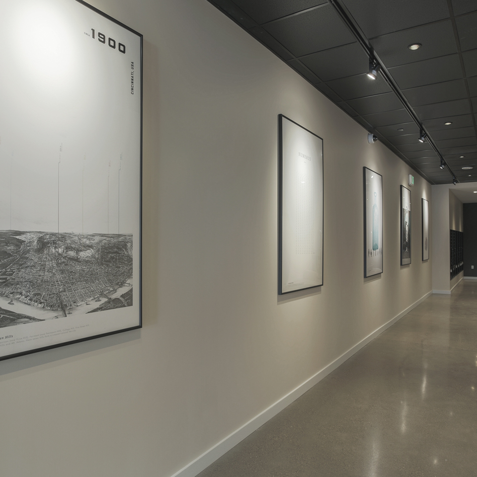 Seven at Broadway hallway with branded posters on the walls
